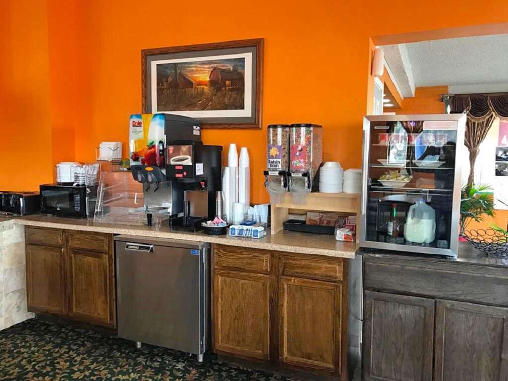 Asam Hotel Goodland Nhà hàng bức ảnh